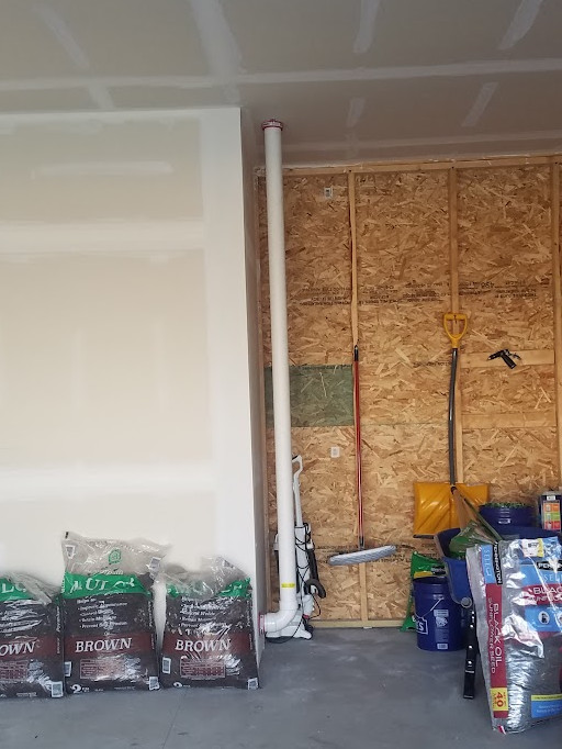 Typical garage and attic vent piping route. Mitigation system. Radon Safe Homes and Businesses