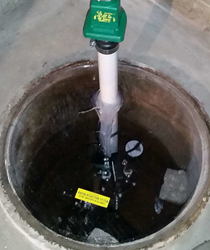 Sealed clear sump lid. Radon Safe Homes and Businesses