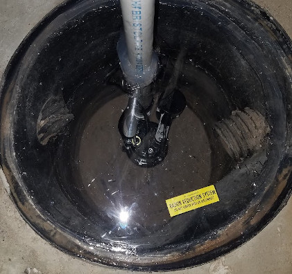 Clear plastic airtight lid on sump pit.  Custom made. Radon Safe Homes and Businesses